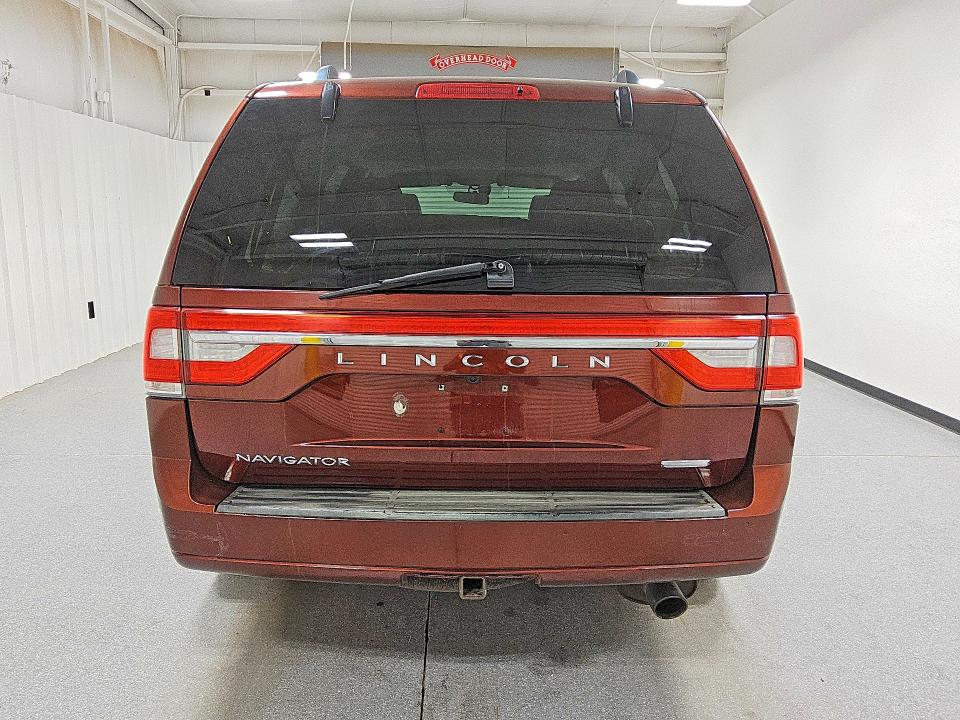 2015 Lincoln townhouse Navigator VIN 5LMJJ2JT5FEJ10410 COPART salvage auction — NORMAL WEAR, WV - CERTIFICATE OF TITLE, sold $2,500 on 2026-07-07 (photo 6)