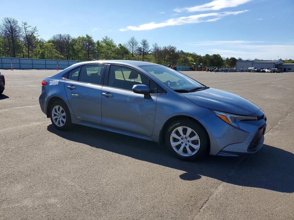 2023 Toyota Corolla VIN JTDBDMHE3PJ002463 COPART salvage auction — WATER/FLOOD, Ny - Mv907A-Flood Salvage, sold $3,900 on 2026-07-20 (photo 4)