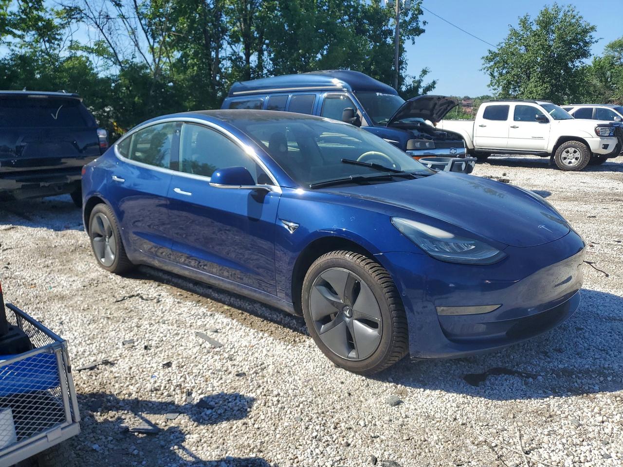 2018 Tesla Model 3 VIN 5YJ3E1EA6JF017006 COPART salvage auction — Side, MD - CERTIFICATE OF TITLE (P), sold $5,900 on 2026-07-03 (photo 4)