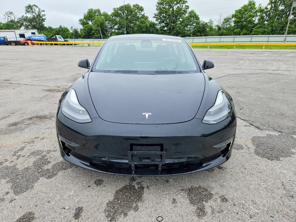 2021 Tesla Model 3 VIN 5YJ3E1EA0MF907067 COPART salvage auction — HAIL, Mo - Salvage Certificate Of Title, sold $8,700 on 2026-08-03 (photo 5)