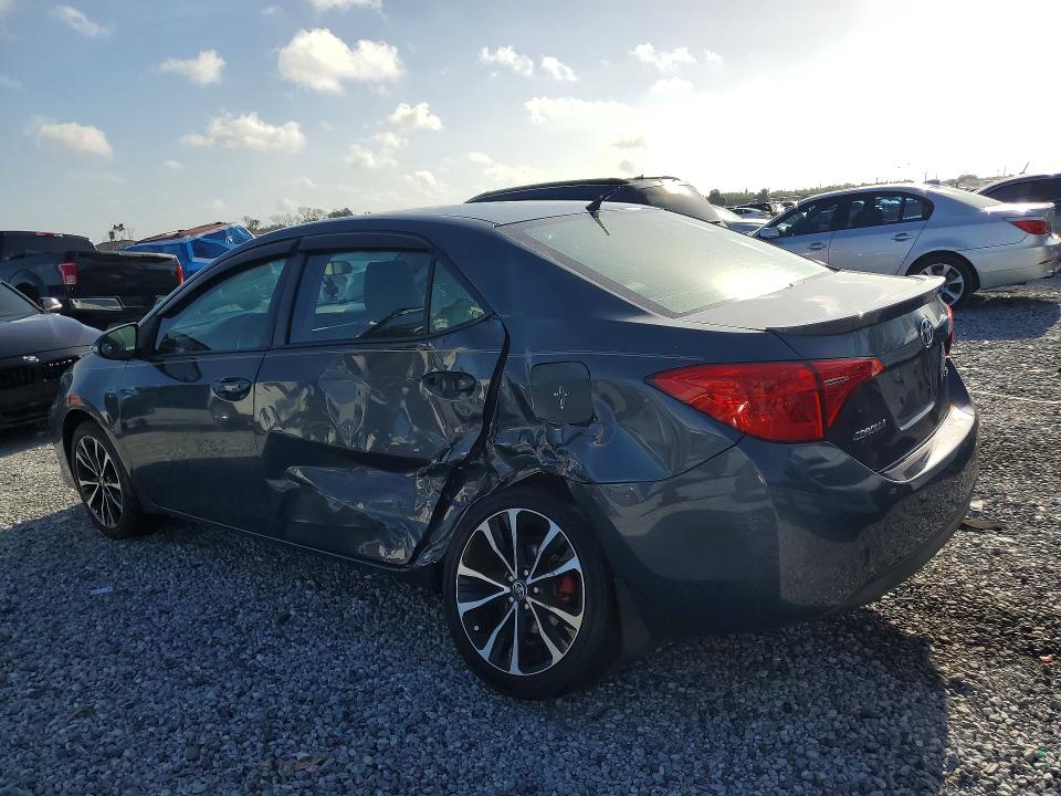 2018 Toyota Corolla VIN 5YFBURHEXJP842546 COPART salvage auction — SIDE, Fl - Cert Of Title Slvg Rebuildable, sold $3,250 on 2026-07-17 (photo 2)
