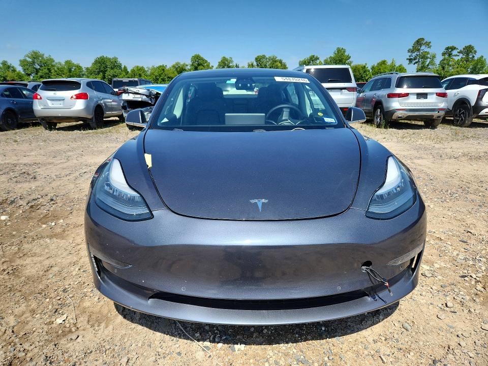 2020 Tesla VIN 5YJ3E1EB2LF534797 COPART salvage auction — WATER/FLOOD, Tx - Salvage Title-Flood Damage, sold $5,100 on 2026-07-07 (photo 5)