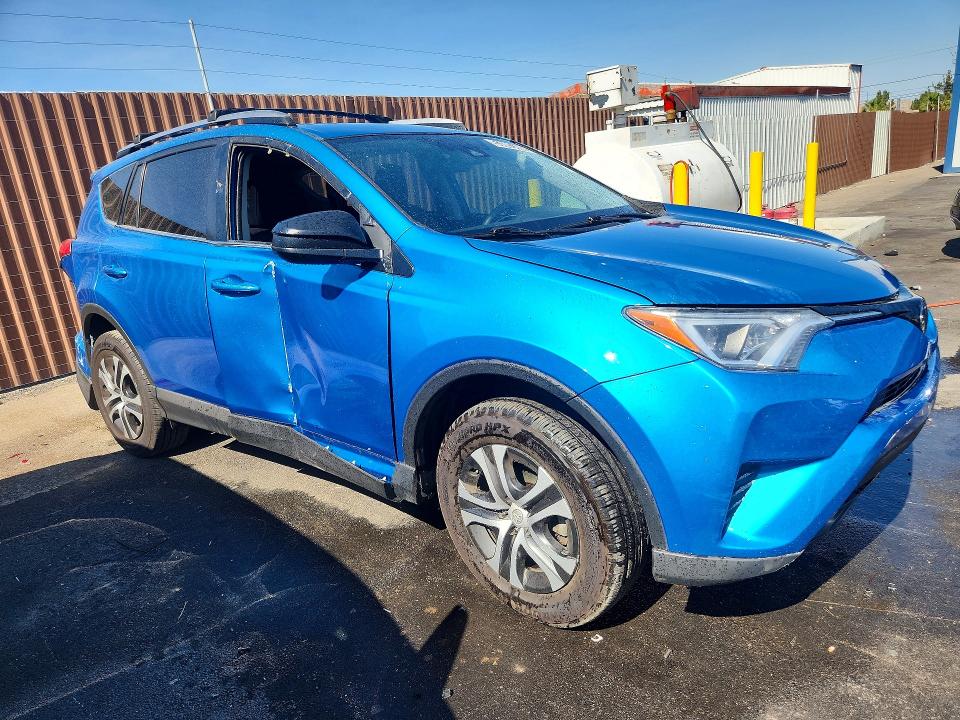 2017 Toyota Rav 4 VIN JTMZFREV5HD094539 COPART salvage auction — SIDE, Nv - Salvage Title, sold $1,750 on 2026-07-07 (photo 4)