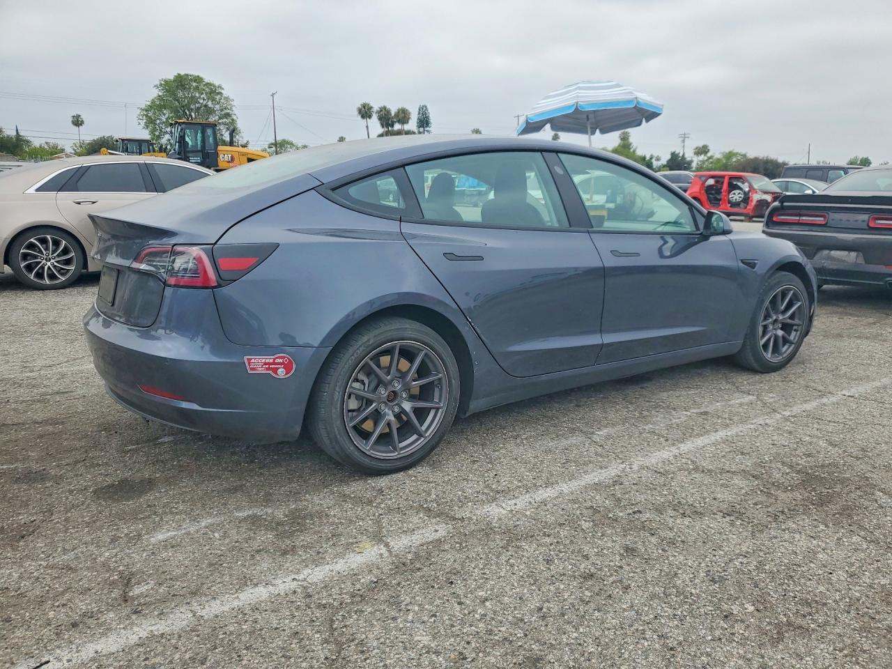 2021 Tesla Model 3 VIN 5YJ3E1EA5MF100589 COPART salvage auction — Rear End, CA - SALVAGE CERTIFICATE, sold $8,500 on 2026-07-10 (photo 3)