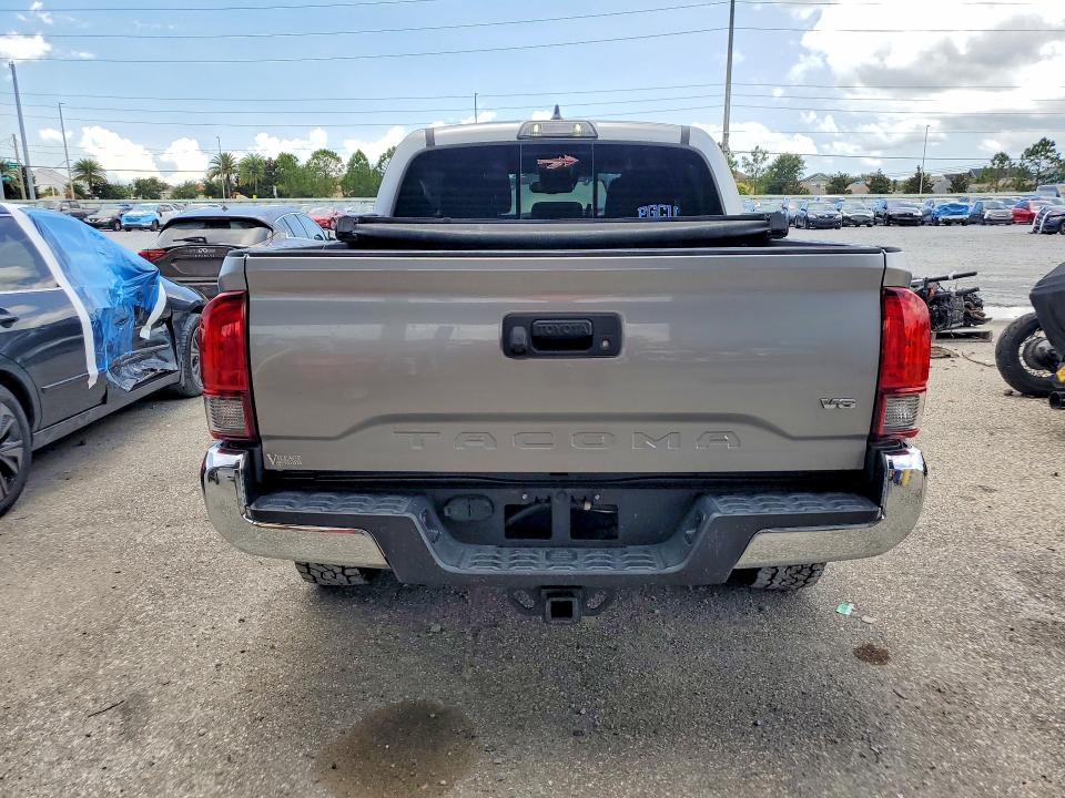 2018 Toyota Tacoma VIN 5TFAZ5CN3JX069997 COPART salvage auction — SIDE, FL - CERT OF TITLE SLVG REBUILDABLE, sold $10,100 on 2026-07-31 (photo 6)