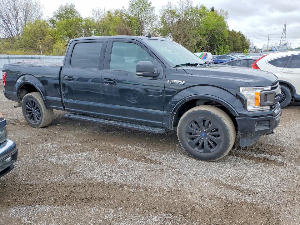2018 Ford F-150 lightning VIN 1FTFW1EG1JFC35400 COPART salvage auction — VANDALISM, On - Permit Rebuilt - Unfit, sold $10,600 on 2026-07-03 (photo 4)