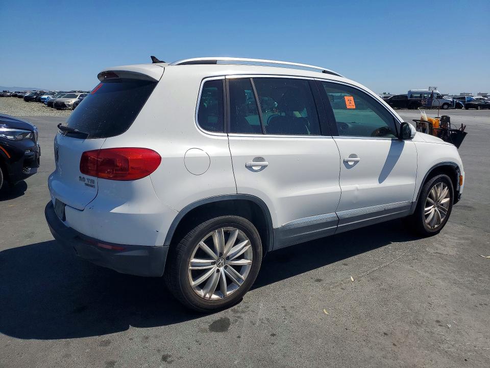 2013 Volkswagen Tiguan VIN WVGBV3AXXDW601034 COPART salvage auction — MINOR DENT/SCRATCHES, CA - DIS/DLR/EXP ONLY CLEAN TITLE, sold $2,100 on 2026-07-20 (photo 3)