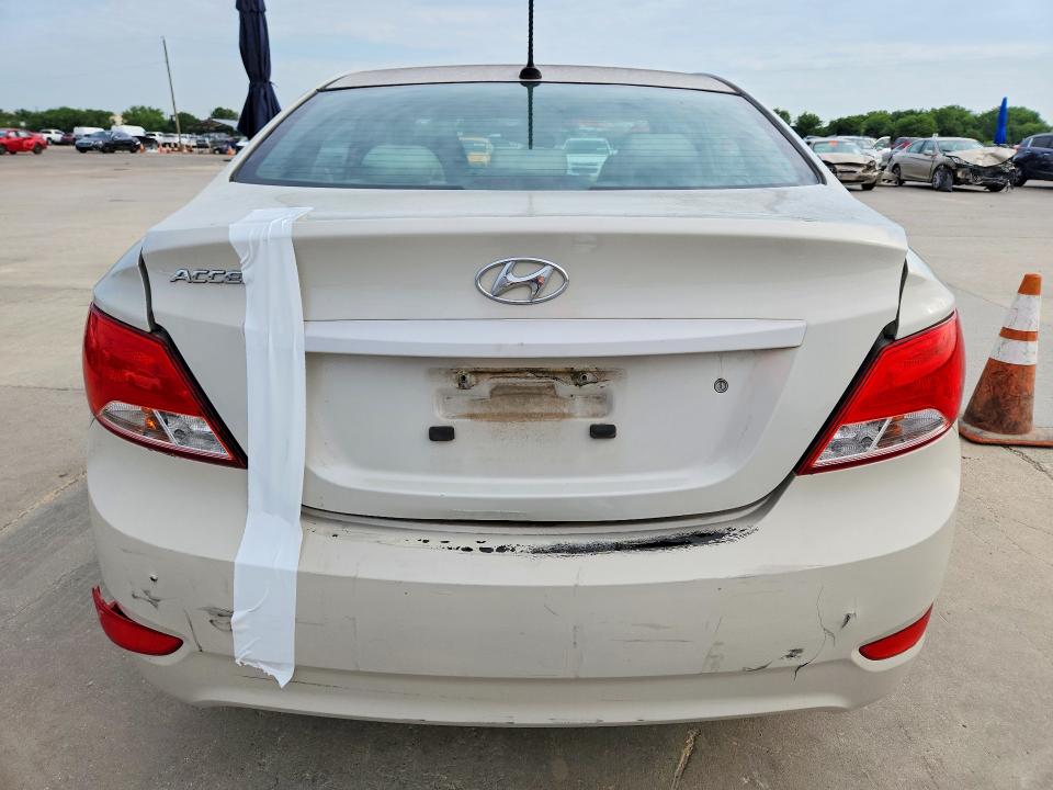 2016 Hyundai Accent VIN KMHCT4AE0GU043886 COPART salvage auction — REAR END, TX - CERT OF TITLE-REBUILT SALVAGE, sold $675 on 2026-07-16 (photo 6)