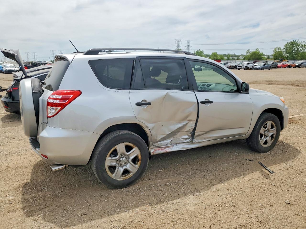 2010 Toyota RAV4 VIN JTMBF4DV0AD038407 COPART salvage auction — Side, IL - SALVAGE CERTIFICATE, sold $2,100 on 2026-06-30 (photo 3)