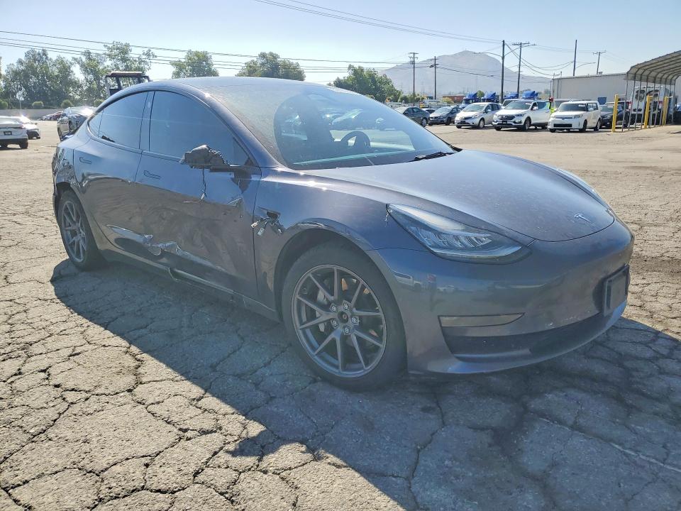 2022 Tesla VIN 5YJ3E1EB4NF298947 COPART salvage auction — SIDE, Ca - Salvage Certificate, sold $7,700 on 2026-07-02 (photo 4)