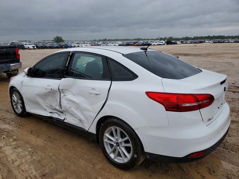 2017 Ford Focus VIN 1FADP3F27HL300674 COPART salvage auction — SIDE, Tx - Salvage Vehicle Title, sold $2,900 on 2026-07-02 (photo 2)
