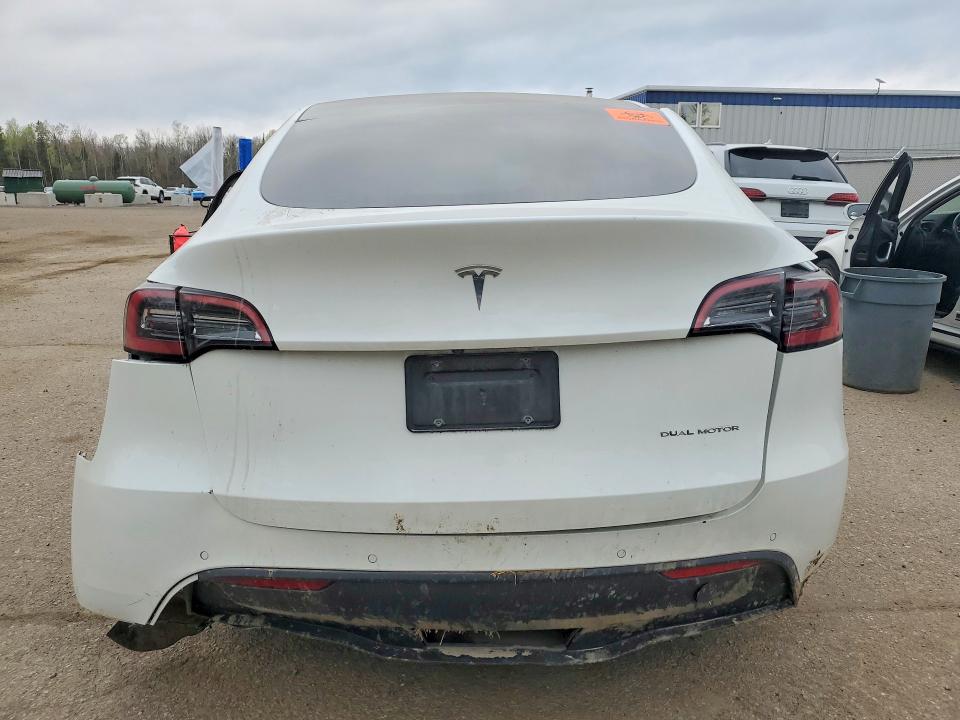 2022 Tesla Model y VIN 7SAYGDEE8NF361840 COPART salvage auction — SIDE, On - Permit Salvage, sold $5,700 on 2026-07-07 (photo 6)