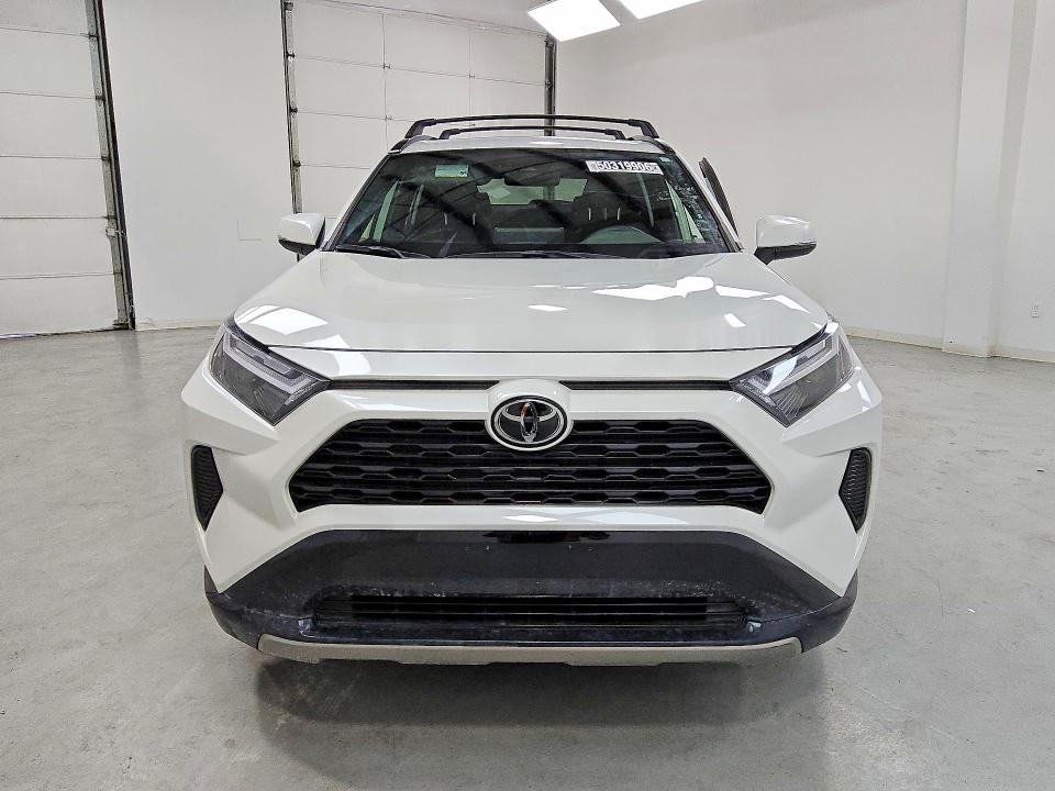 2025 Toyota Rav4 hybrid VIN JTM16RFV3SD169810 COPART salvage auction — SIDE, In - Certificate Of Title, sold $9,300 on 2026-07-30 (photo 5)