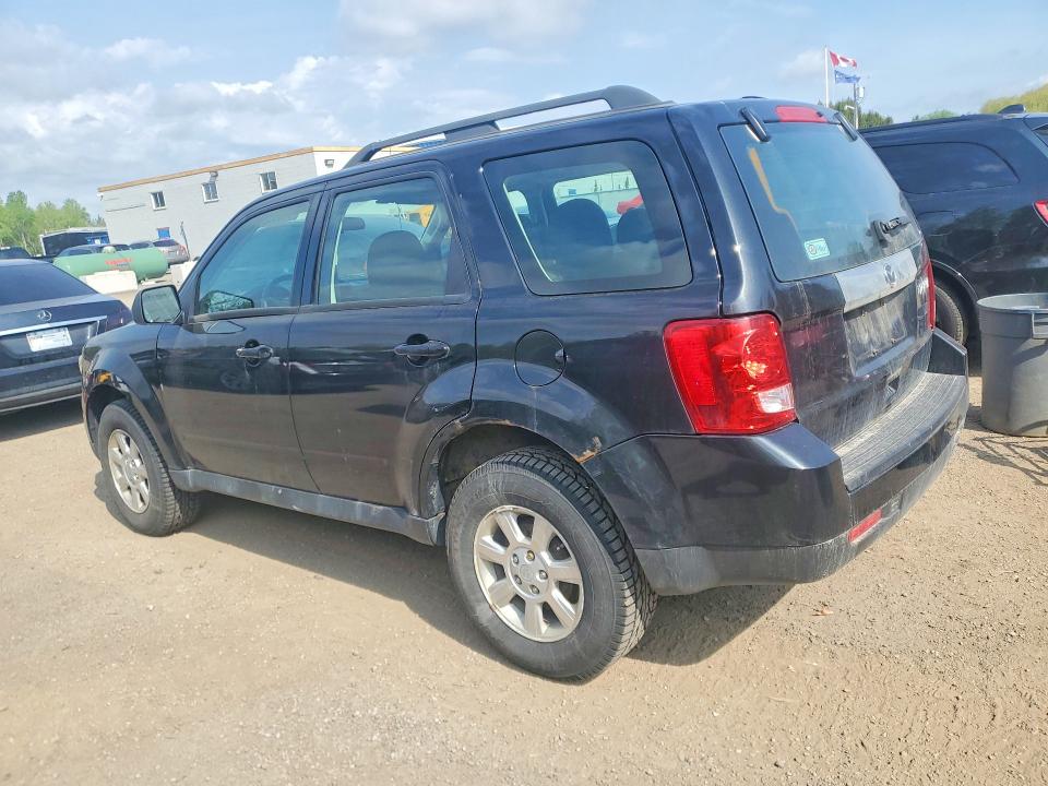 2011 Mazda Tribute VIN 4F2CY0C71BKM00946 COPART salvage auction — MINOR DENT/SCRATCHES, On - Permit No Brand - Unfit, sold $750 on 2026-07-03 (photo 2)