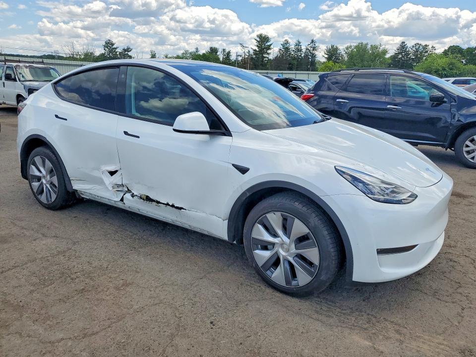 2023 Tesla Model y VIN 7SAYGDEE9PA053379 COPART salvage auction — SIDE, Pa - Certificate Of Salvage, sold $12,900 on 2026-07-02 (photo 4)