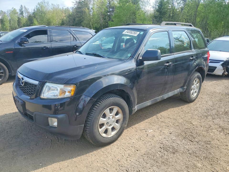 2011 Mazda Tribute VIN 4F2CY0C71BKM00946 COPART salvage auction — MINOR DENT/SCRATCHES, On - Permit No Brand - Unfit, sold $750 on 2026-07-03 (photo 1)