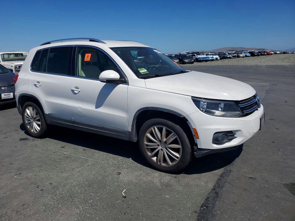 2013 Volkswagen Tiguan VIN WVGBV3AXXDW601034 COPART salvage auction — MINOR DENT/SCRATCHES, CA - DIS/DLR/EXP ONLY CLEAN TITLE, sold $2,100 on 2026-07-20 (photo 4)