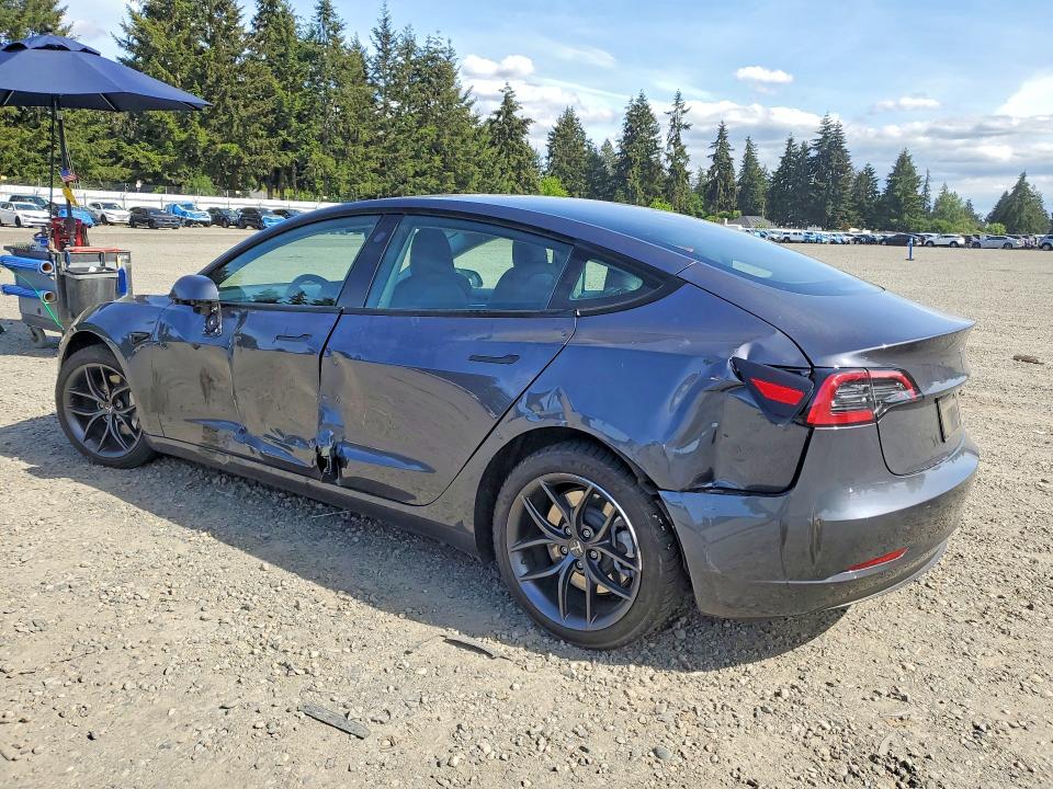 2023 Tesla Model 3 VIN 5YJ3E1EA4PF701982 COPART salvage auction — SIDE, Salvage Title, sold $7,800 on 2026-07-10 (photo 2)