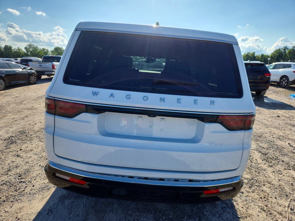 2025 Jeep Grand wagoneer VIN 1C4SJSDP9SS504613 COPART salvage auction — SIDE, Tx - Salvage Vehicle Title, sold $24,100 on 2026-07-24 (photo 6)