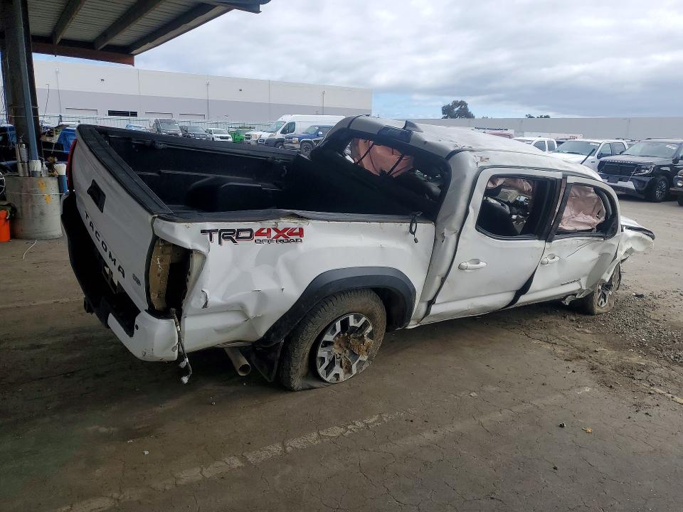 2019 Toyota Tacoma VIN 5TFCZ5AN9KX188554 COPART salvage auction — ROLLOVER, CA - NON-REPAIRABLE VEHICLE CERT, sold $300 on 2026-07-21 (photo 3)