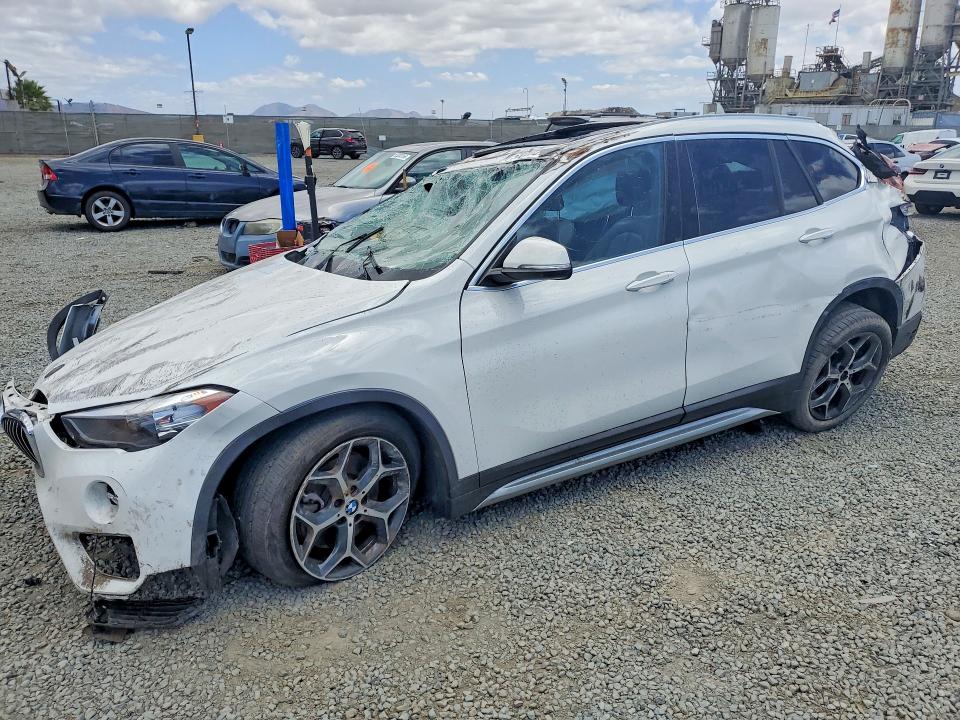 2019 BMW X1 VIN WBXHU7C59K5L11202 — COPART salvage auction photo