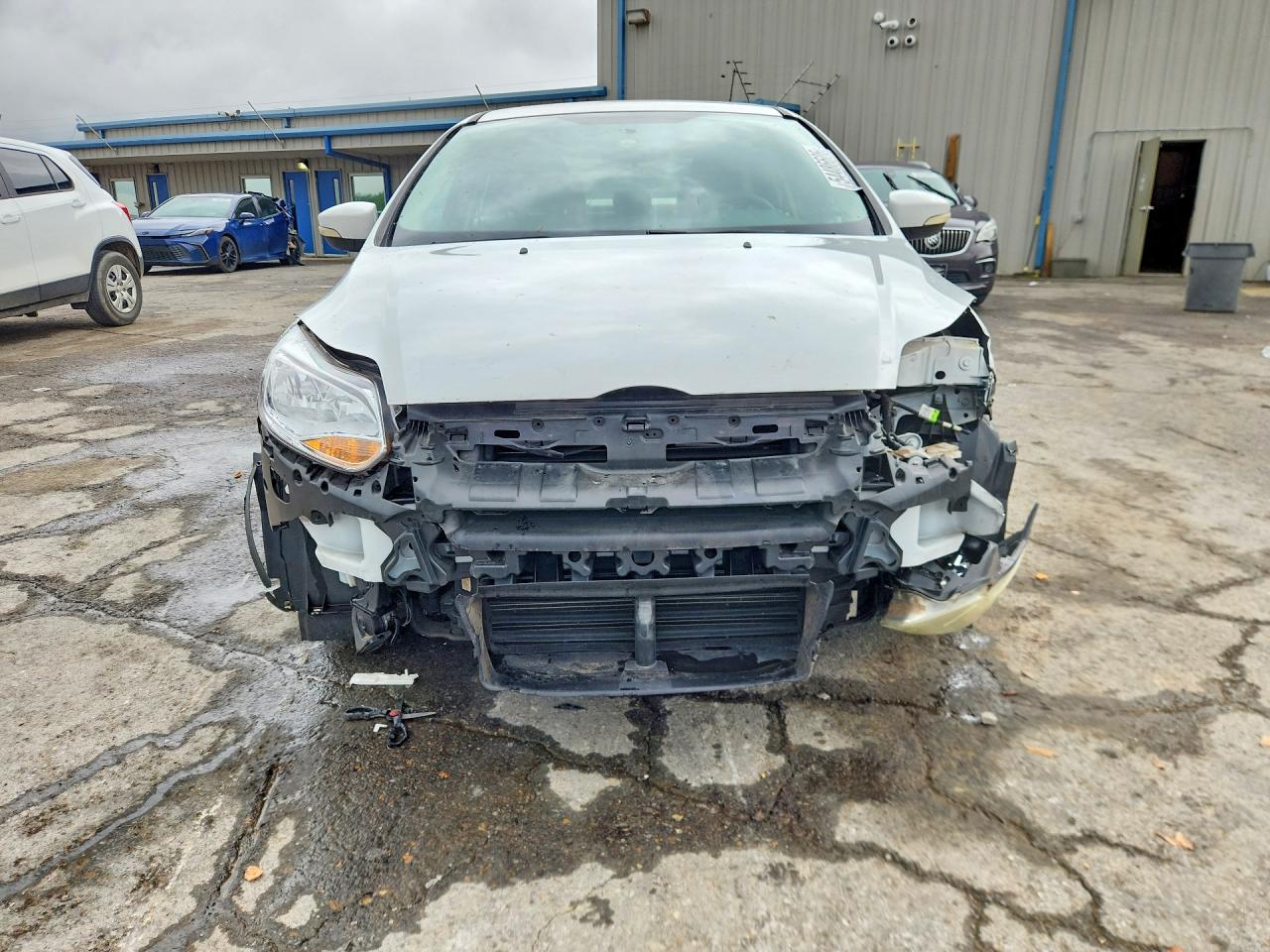 2014 Ford Focus VIN 1FADP3F22EL172999 COPART salvage auction — Front End, TN - SALVAGE CERTIFICATE, sold $800 on 2026-07-09 (photo 5)