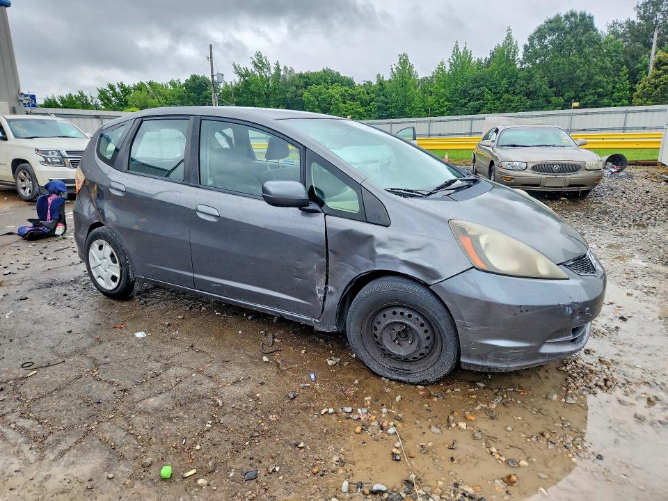 2013 Honda Fit VIN JHMGE8H32DC008178 COPART salvage auction — SIDE, Tn - Salvage Certificate, sold $750 on 2026-07-07 (photo 4)