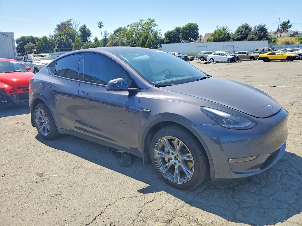 2023 Tesla Model y VIN 7SAYGDEE3PF873394 COPART salvage auction — SIDE, CA - SALVAGE CERTIFICATE, sold $13,200 on 2026-07-31 (photo 4)