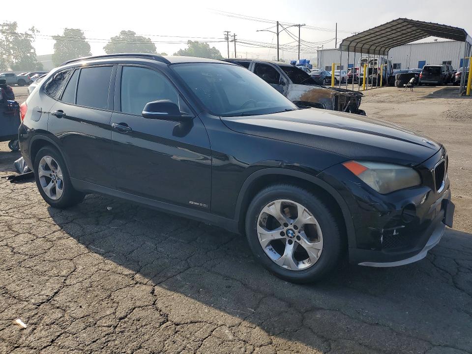2015 BMW X1 VIN WBAVM1C51FV316023 COPART salvage auction — MINOR DENT/SCRATCHES, Ca - Dis/Dlr/Exp Only Clean Title, sold $1,350 on 2026-07-27 (photo 4)