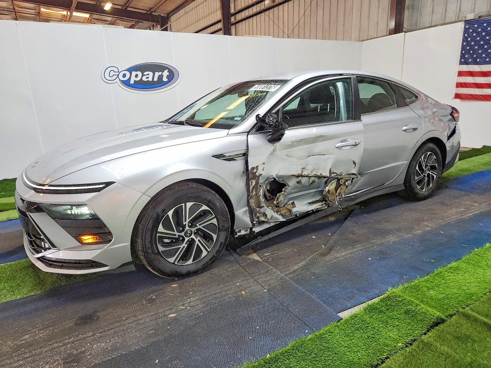 2026 Hyundai Sonata hybrid VIN KMHL24JJ7TA163292 COPART salvage auction — SIDE, FL - CERTIFICATE OF TITLE (P), sold $11,400 on 2026-07-15 (photo 1)