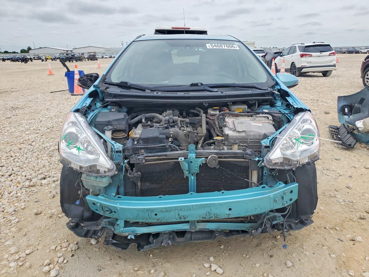 2012 Toyota Prius C VIN JTDKDTB37C1018273 COPART salvage auction — Front End, TX - SALVAGE VEHICLE TITLE (P), sold $475 on 2026-07-09 (photo 5)