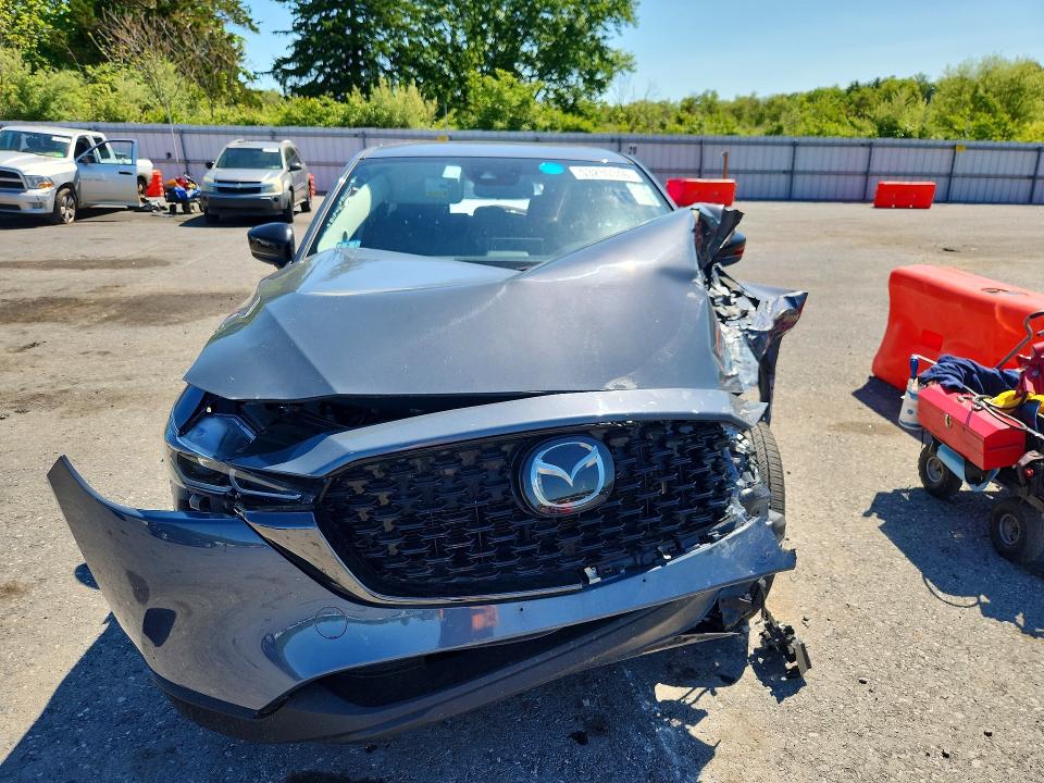 2025 Mazda Cx-5 VIN JM3KFBCM1S0675349 COPART salvage auction — ALL OVER, Fl - Certificate Of Destruction, sold $4,600 on 2026-07-14 (photo 5)