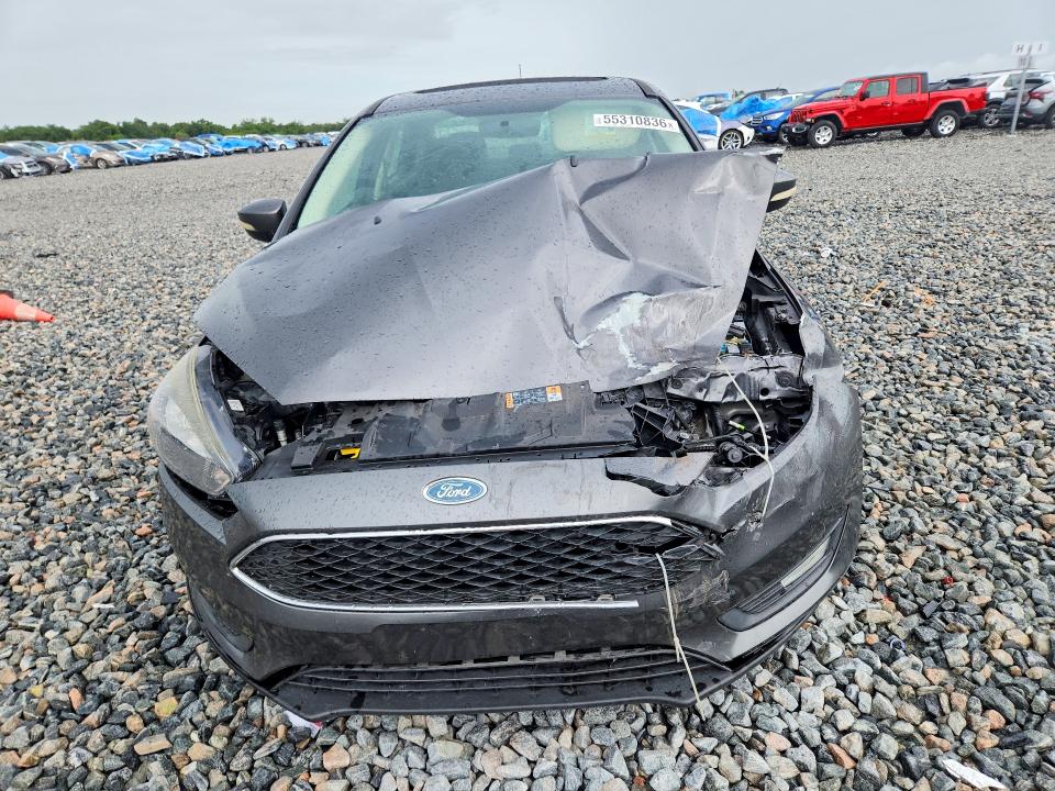 2018 Ford Focus VIN 1FADP3H25JL243488 COPART salvage auction — FRONT END, Fl - Cert Of Title Slvg Rebuildable, sold $575 on 2026-08-01 (photo 5)