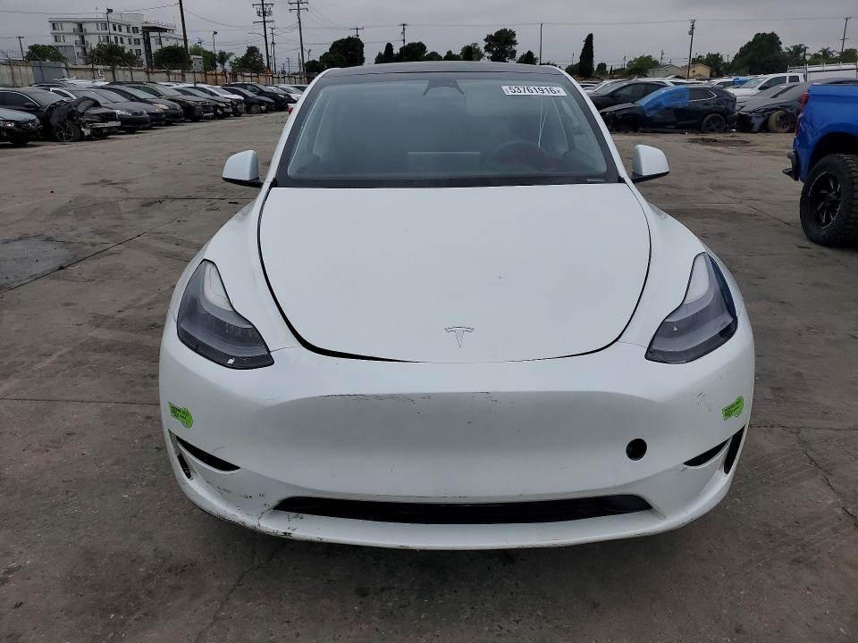 2023 Tesla Model y VIN 7SAYGAEEXPF742736 COPART salvage auction — SIDE, Ca - Salvage Certificate, sold $14,200 on 2026-07-29 (photo 5)