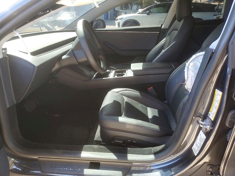 2025 Tesla Model 3 VIN 5YJ3E1EA6SF029013 COPART salvage auction — FRONT END, Ca - Salvage Certificate, sold $13,200 on 2026-07-28 (photo 7)