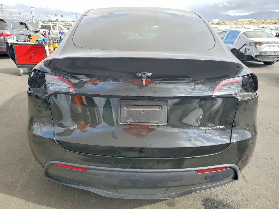 2023 Tesla Model y VIN 7SAYGDEE3PA178068 COPART salvage auction — SIDE, Salvage Title, sold $12,100 on 2026-07-29 (photo 6)