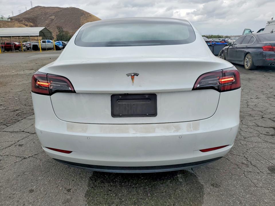 2019 Tesla Model 3 VIN 5YJ3E1EA9KF509546 COPART salvage auction — SIDE, CA - SALVAGE CERTIFICATE, sold $4,400 on 2026-07-16 (photo 6)