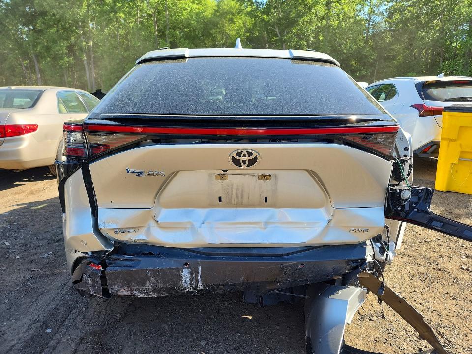 2025 Toyota Bz4x VIN JTMABACA1SA096646 COPART salvage auction — REAR END, MA - CERT OF TITLE-SALVAGE, sold $10,700 on 2026-07-16 (photo 6)