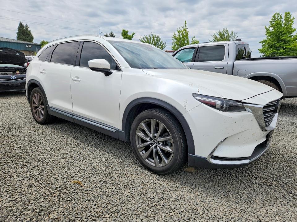 2016 Mazda VIN JM3TCBDY4G0108591 COPART salvage auction — SIDE, OR - SALVAGE TITLE CERTIFICATE, sold $4,650 on 2026-07-07 (photo 4)
