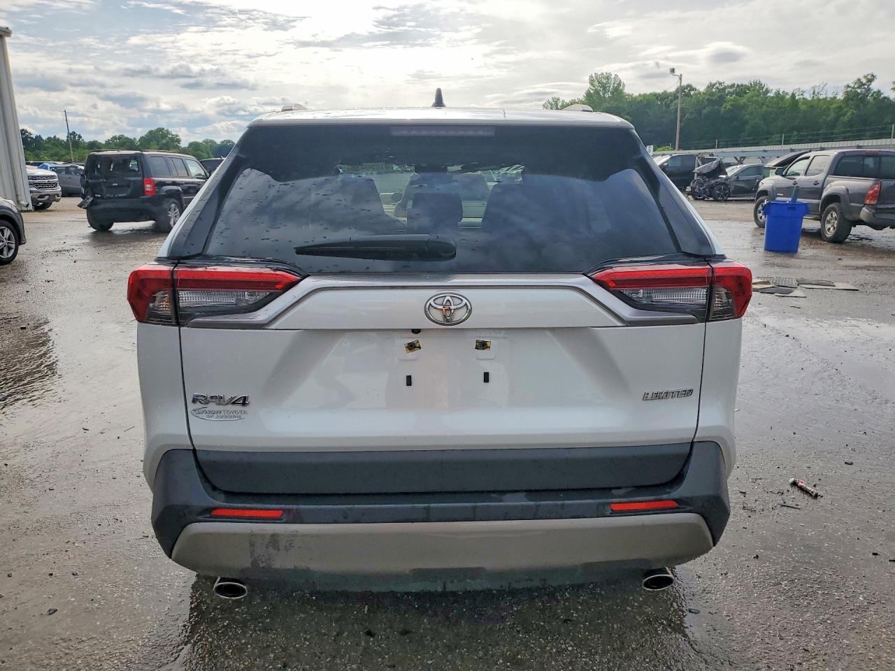 2023 Toyota RAV4 VIN JTMY1RFV3PD104931 COPART salvage auction — Side, AL - CERT OF TITLE-SALVAGE TITLE, sold $11,200 on 2026-07-02 (photo 6)