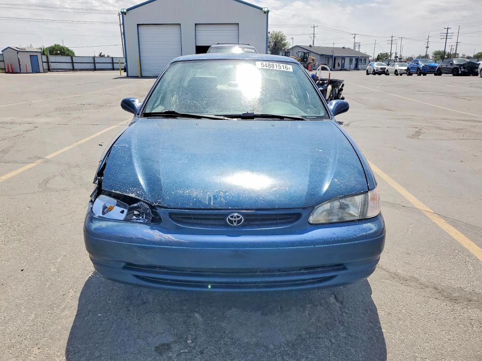 1999 Toyota Corolla VIN 1NXBR12E9XZ210432 COPART salvage auction — SIDE, Id - Salvage Certificate Of Title, sold $150 on 2026-07-09 (photo 5)