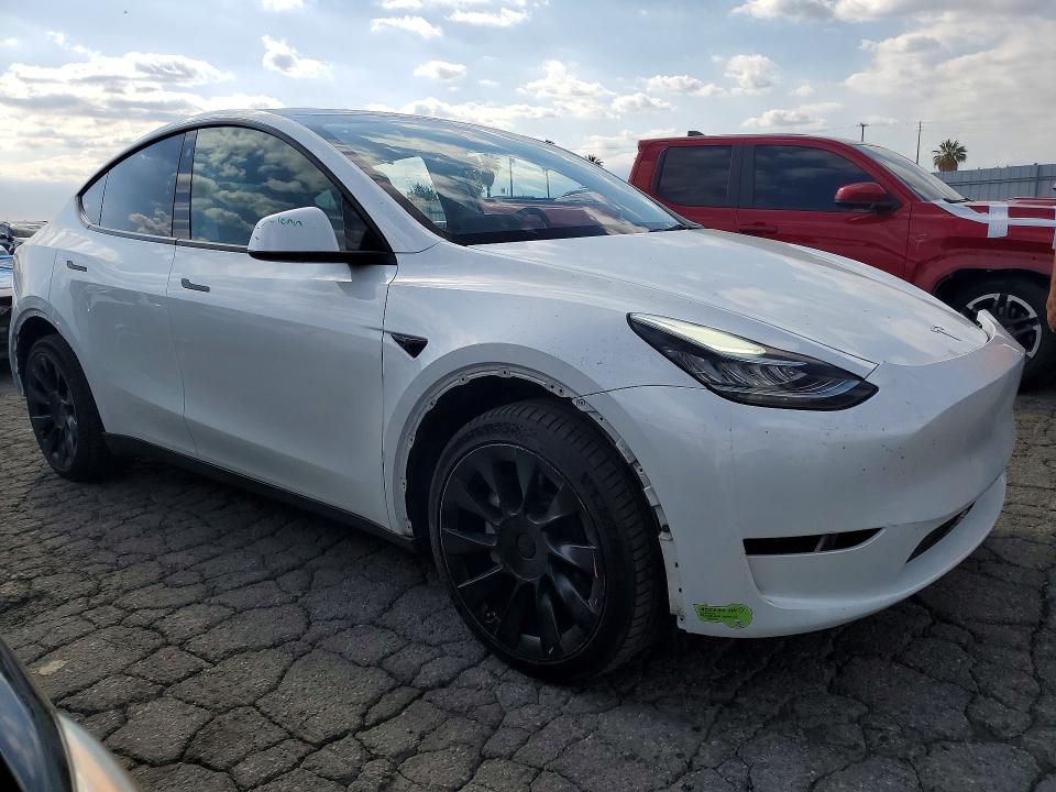 2023 Tesla Model y VIN 7SAYGDEE3PA030678 COPART salvage auction — REAR END, Ca - Salvage Certificate, sold $10,200 on 2026-07-16 (photo 4)