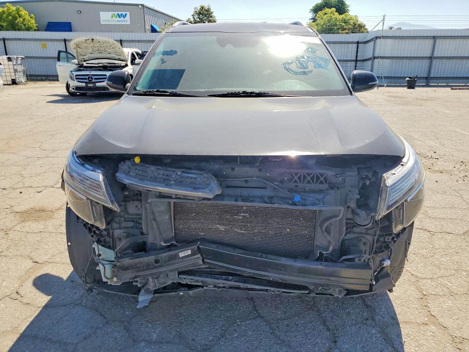 2021 Kia Seltos VIN KNDEUCAA9M7122159 COPART salvage auction — FRONT END, Ca - Salvage Certificate, sold $2,050 on 2026-07-06 (photo 5)