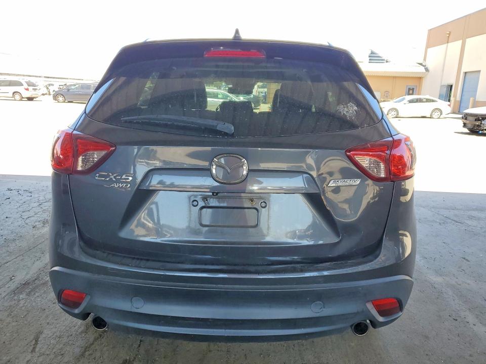 2014 Mazda Cx-5 VIN JM3KE4DY5E0384664 COPART salvage auction — VANDALISM, Ca - Salvage Certificate, sold $3,300 on 2026-07-09 (photo 6)