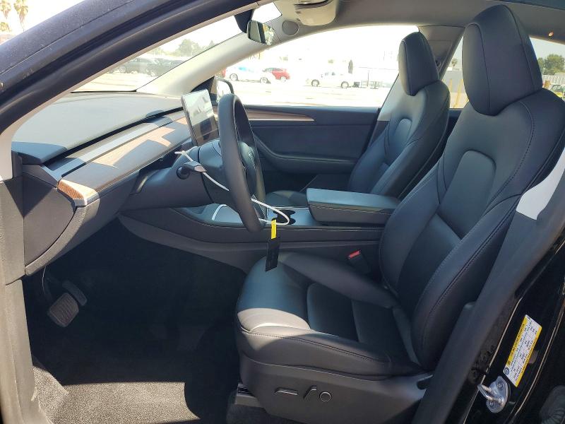 2024 Tesla Model y VIN 7SAYGDED5RF115258 COPART salvage auction — REAR END, Ca - Salvage Certificate, sold $15,000 on 2026-07-24 (photo 7)