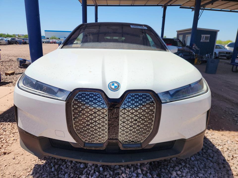 2025 BMW Ix VIN WB523CF08SCT80355 COPART salvage auction — SIDE, Az - Cert Of Title - Salvage, sold $18,700 on 2026-07-16 (photo 5)