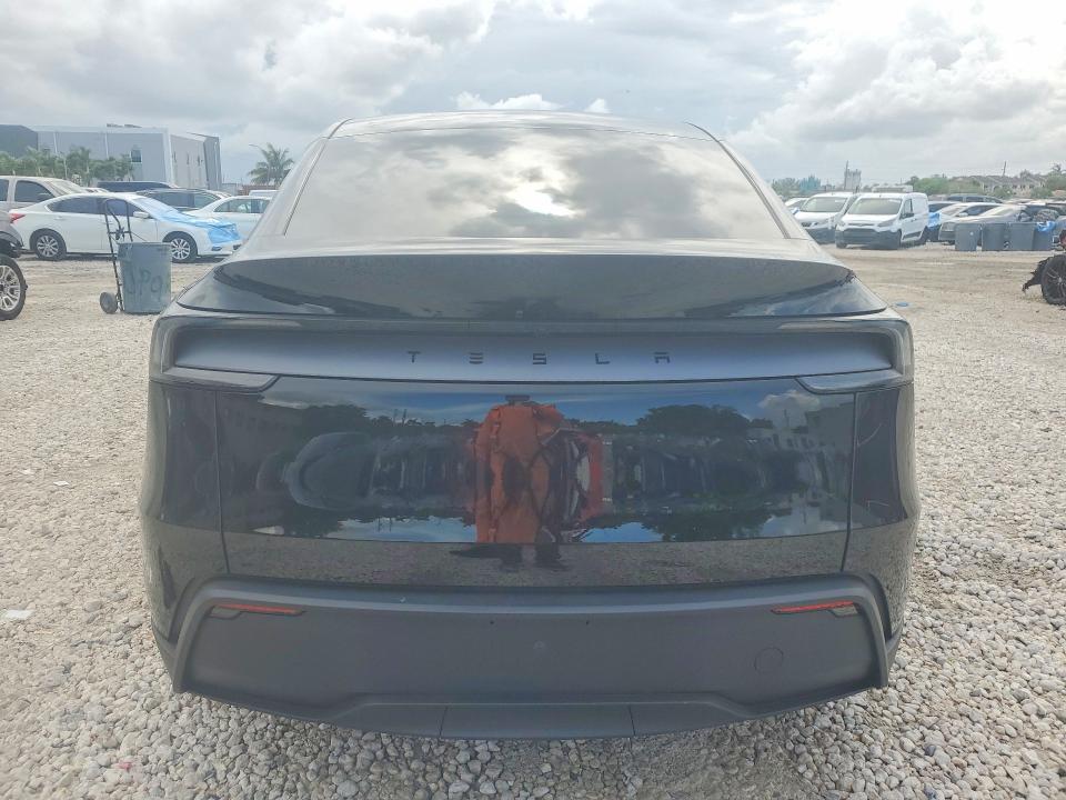 2026 Tesla Model y VIN 7SAYGDED0TA655752 COPART salvage auction — SIDE, Fl - Certificate Of Destruction, sold $6,600 on 2026-07-28 (photo 6)