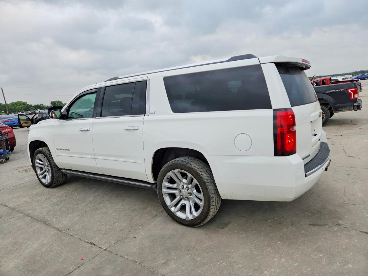 2015 Chevrolet Suburban VIN 1GNSKKKC0FR243809 COPART salvage auction — Hail, TX - CERTIFICATE OF TITLE, sold $3,450 on 2026-07-02 (photo 2)