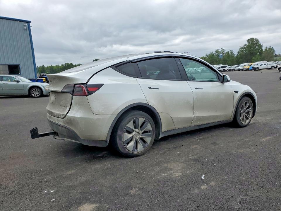 2023 Tesla Model y VIN 7SAYGDEE3PF909035 COPART salvage auction — SIDE, Or - Salvage Title Certificate, sold $8,000 on 2026-07-08 (photo 3)