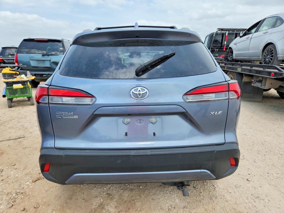 2024 Toyota Corolla cross VIN 7MUDAAAG4RV089622 COPART salvage auction — SIDE, Tx - Salvage Vehicle Title, sold $8,500 on 2026-07-16 (photo 6)